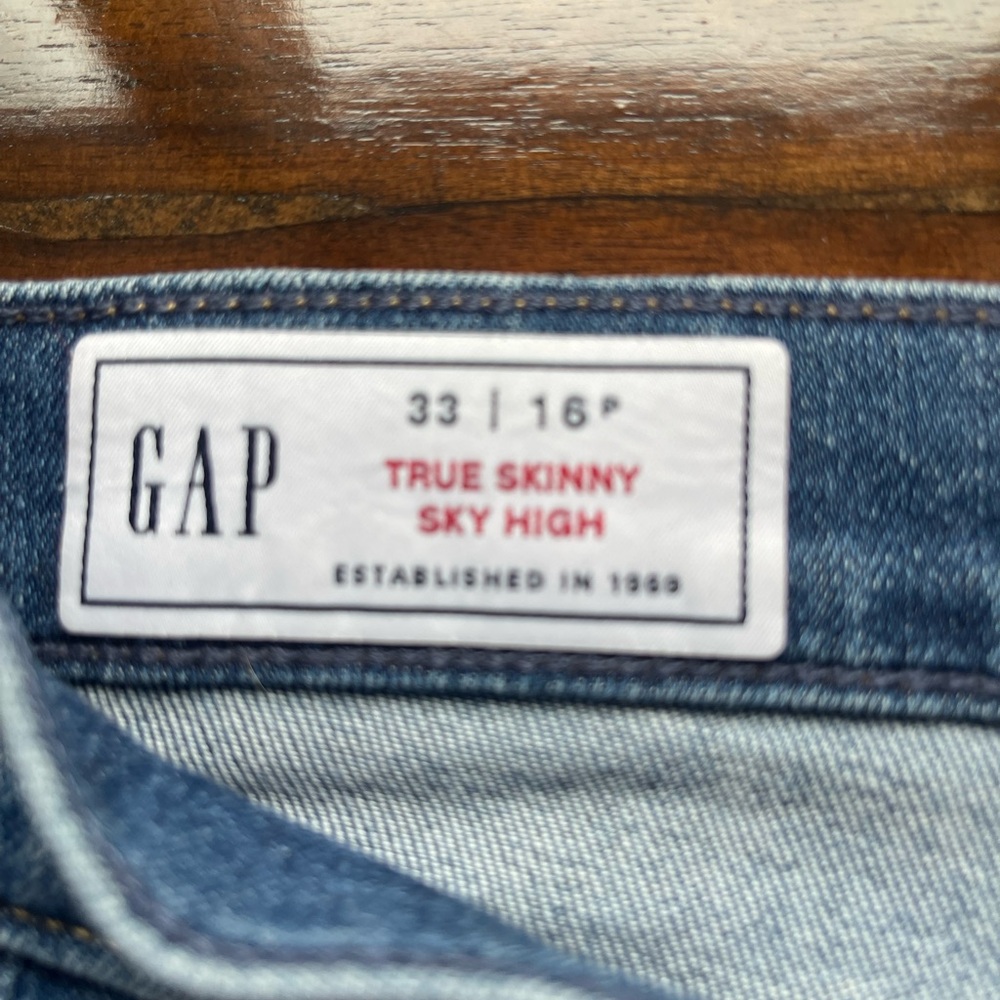 Gap jeans with frayed bottom.